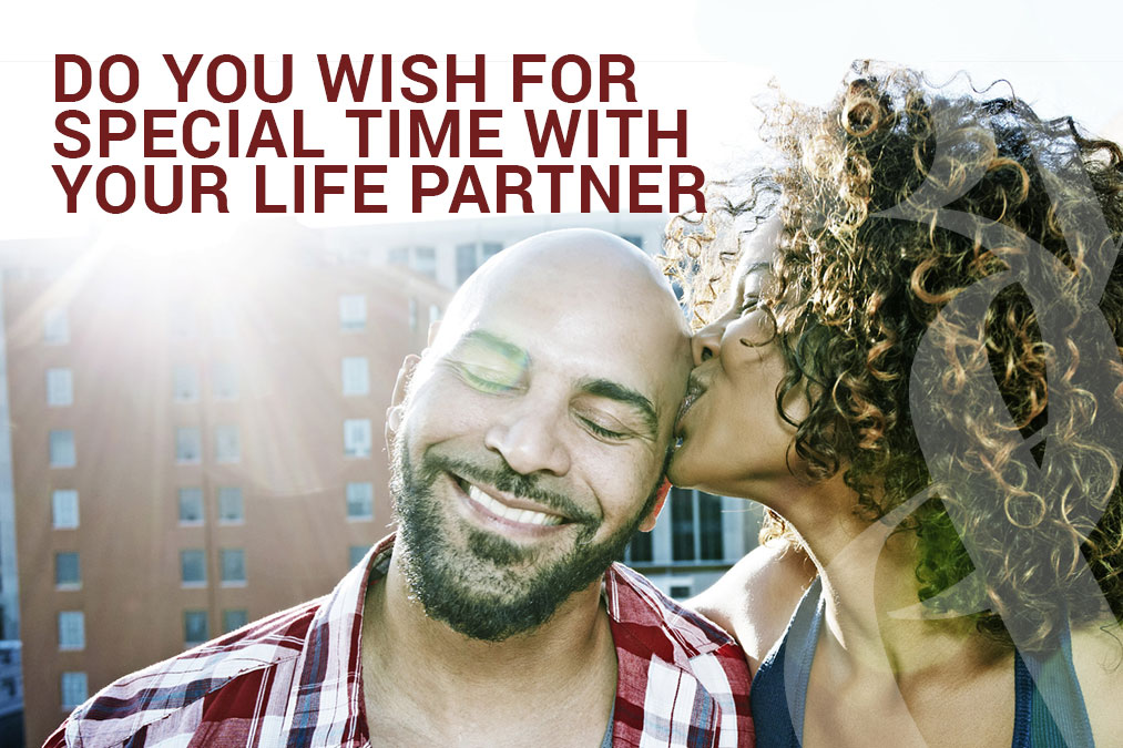 Female kissing husband on head with love and adoration spending special time with your partner.